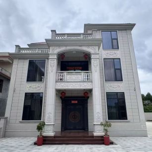 辽源 芝麻白石材别墅干挂案例展示